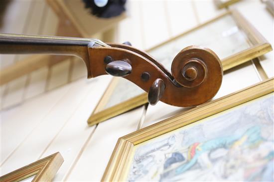 A cello and two bows, cello height 123cm